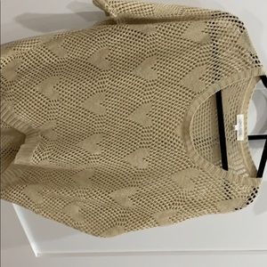 Lovely girl beige sweater with hearts